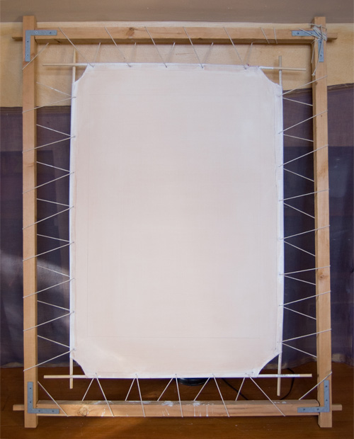 Stretching and preparation of the canvas.